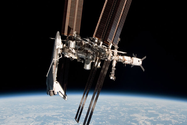 Space Shuttle and Space Station Photographed Together (Credit: NASA)