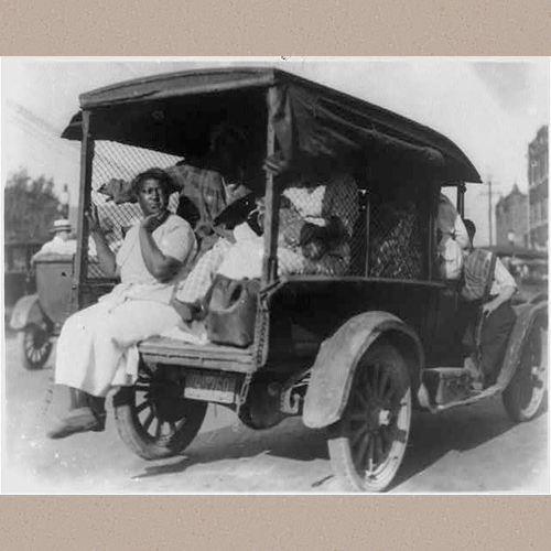 Photograph shows African Americans riding in the back of a truck during the Tulsa Race Massacre, also called Tulsa Race Riot, when a white mob attacked the predominantly African American Greenwood neighborhood of Tulsa, Oklahoma. | Library of Congress Prints and Photographs Division Washington, D.C. 20540 USA | Date Created/Published: 1921