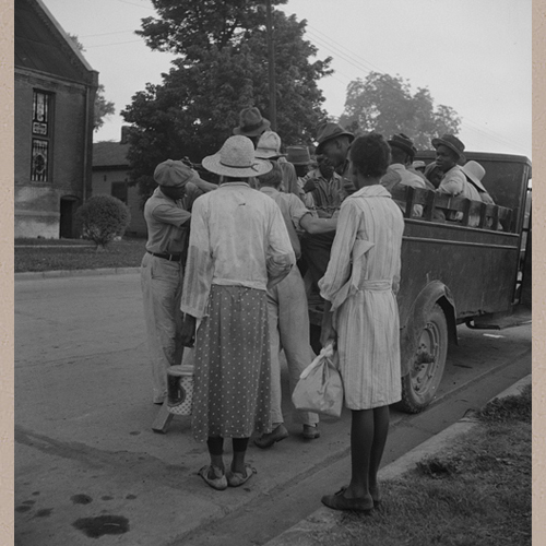 Cotton hoers leaving Greenville at 5 a.m. for a day's work on the plantations. Wages one dollar a day, one dollar and twenty-five cents on a few plantations. Hoers carry their lunches. They return about 8 p.m. Mississippi | Lange, Dorothea, photographer | Library of Congress Prints and Photographs Division Washington, D.C. 20540 USA | Date Created/Published: 1937 June-July
