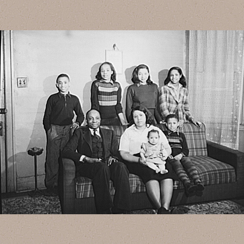 Detroit, Michigan. A typical Negro worker's family. These are conditions under which families originally lived before moving to the Sojourner Truth housing project. Photo shows the John and Lucy Streeter family. Standing, left to right: John, Henrietta, Priscilla, and Mary; seated: John, Lucy, (baby) Jeannette, and Clarence (Source: P. Brown, 2017) | Siegel, Arthur S., photographer | Library of Congress Prints and Photographs Division Washington, D.C. 20540 USA | Date Created/Published: 1942 Feb.