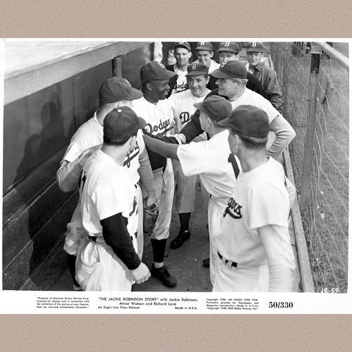 Film still from The Jackie Robinson Story showing Jackie Robinson (as himself) with fellow Dodgers in the dugout. | Copyright by RKO Radio Pictures, Inc. No. JR-59. | Library of Congress Motion Picture, Broadcasting and Recorded Sound Division Washington, D.C. 20540 USA | Date Created/Published: c1950