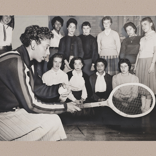 Tennis talk Althea Gibson, U.S. and Wimbledon tennis champion, gives some pointers on the game which has brought her international fame. Some 500 students attended the tennis clinic yesterday at Midwood HS, directed by Murray Eisenstadt, varsity coach | World Telegram & Sun photo by Ford, Ed, photographer | Library of Congress Prints and Photographs Division Washington, D.C. 20540 USA | Date Created/Published: 1957 December