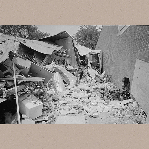 Photograph showing the wreckage of a bomb explosion near the Gaston Motel where Martin Luther King, Jr., and leaders in the Southern Christian Leadership Conference were staying during the Birmingham campaign of the Civil Rights movement. | Library of Congress Prints and Photographs Division Washington, D.C. 20540 USA | Date Created/Published: 1963 May 14