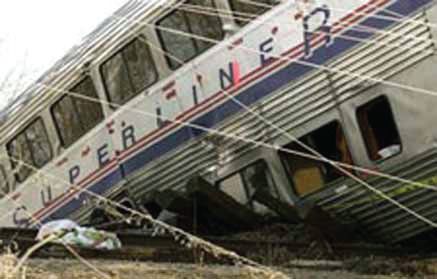 Report 143 of the Major Fires Investigation Project | Amtrak Tram Derailment |NODAWAY, IOWA |MARCH 17, 2001 | Photo of one of the wrecked cars (a double decker)